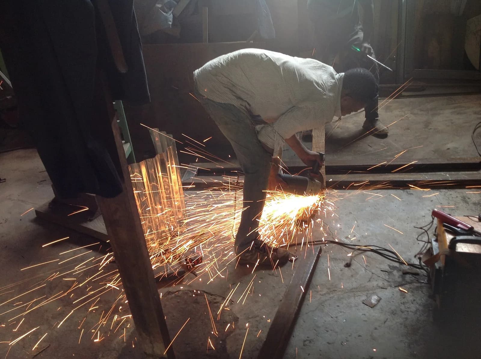 Sample photo, general repairs work in Nigeria: A Dauntless Nigerian Welder at Work