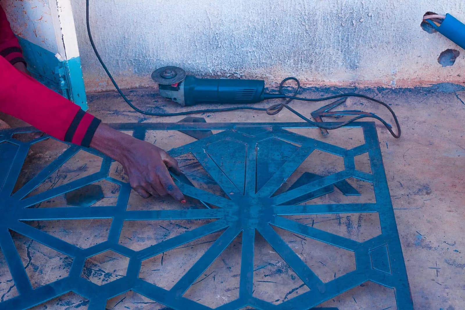 Sample photo, iron burglary work in Nigeria: A welder man