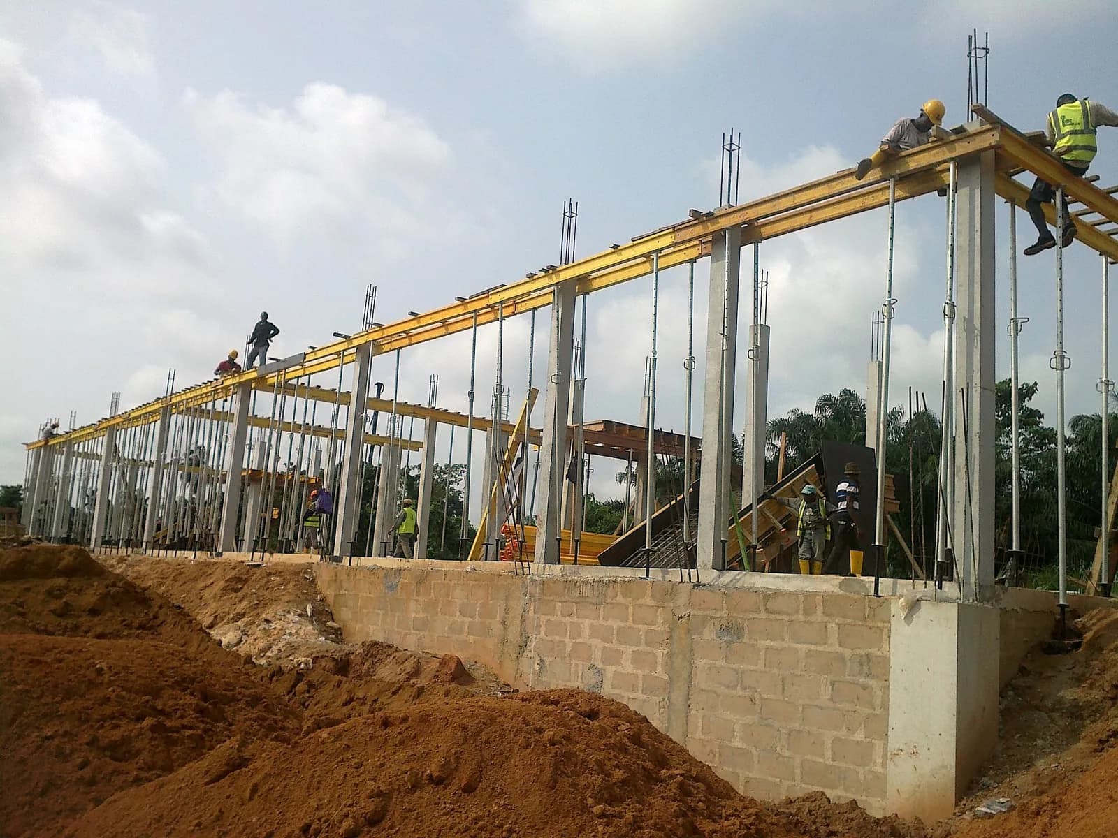 Sample photo, pillars / columns work in Nigeria: African Carpenters on Site in Nigeria
