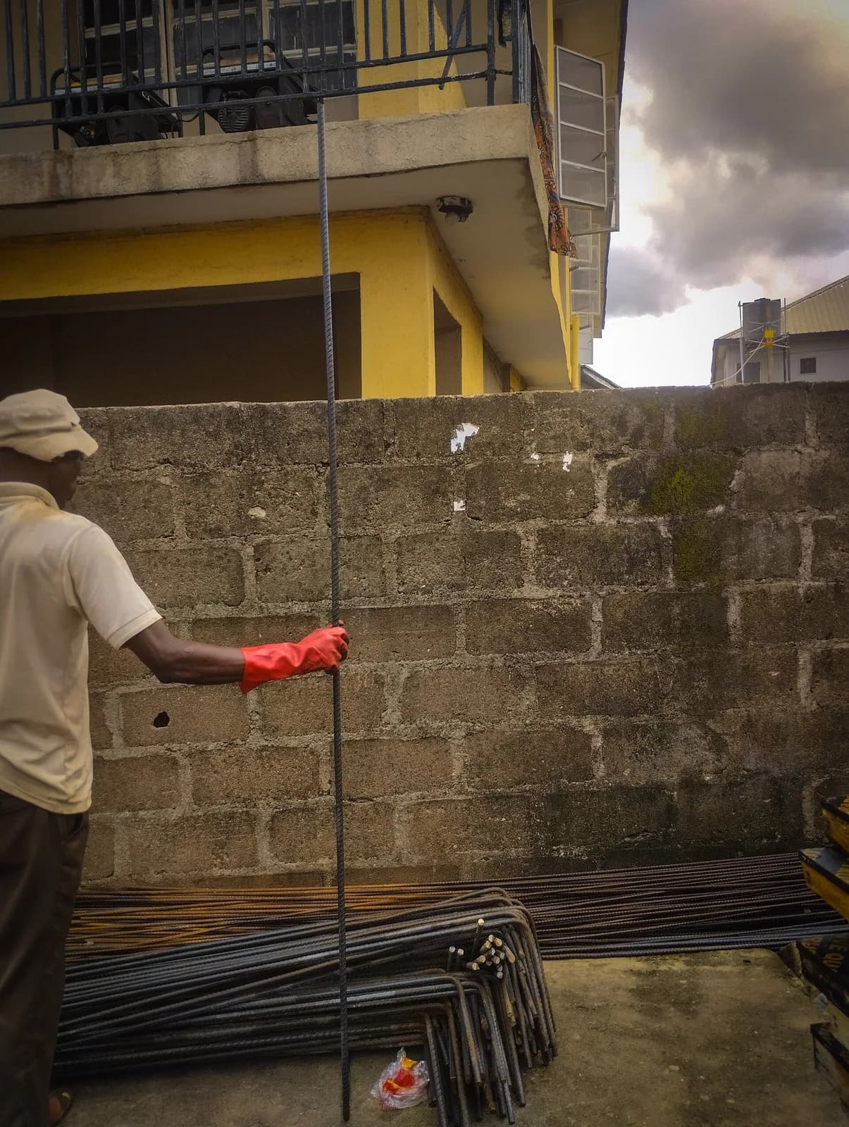 Sample photo, pillars / columns work in Nigeria: Iron bender holding the 16mm
