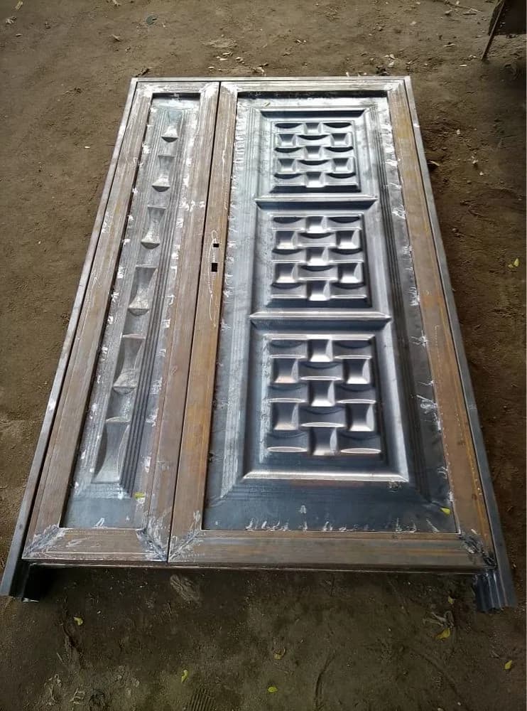Double steel safety door, welded and ready for paint, at the Loyal Point workshop
